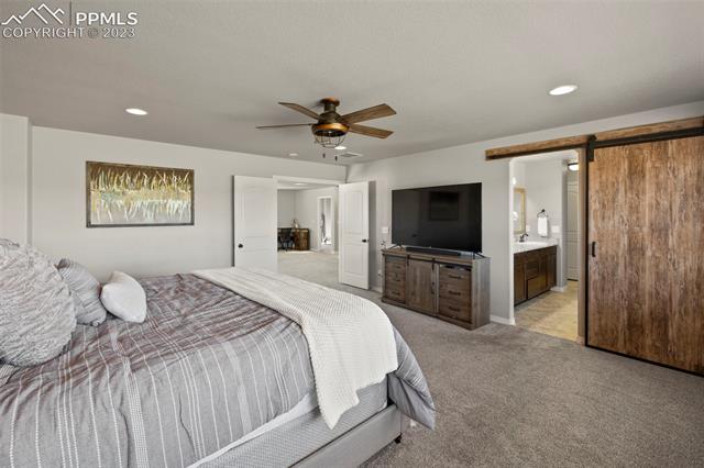8644 Vanderwood Road Colorado Springs, CO 80908 - Photo 24 of 43 Primary is spacious with en suite bathroom