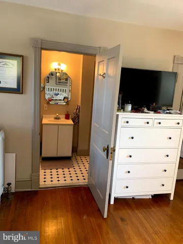 a room with furniture and flat screen tv