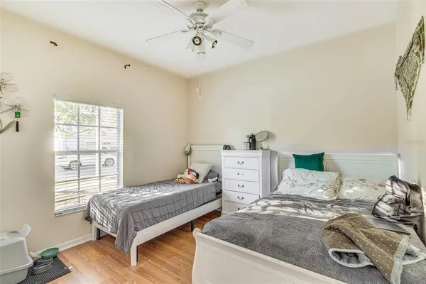 a bedroom with a bed and closet