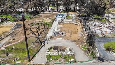 a view of swimming pool with a patio