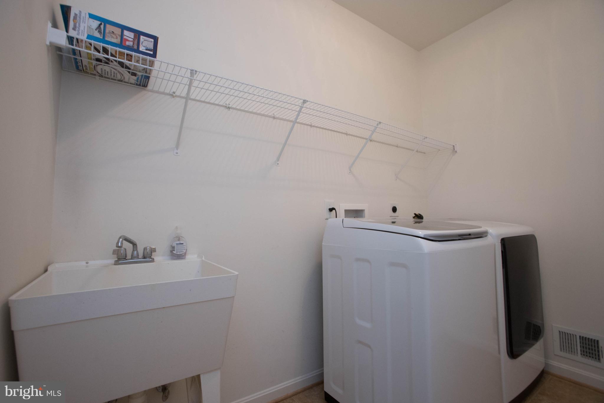 6732 North Stuart Road King George, VA 22485 - Photo 13 of 30 a utility room with dryer and washer