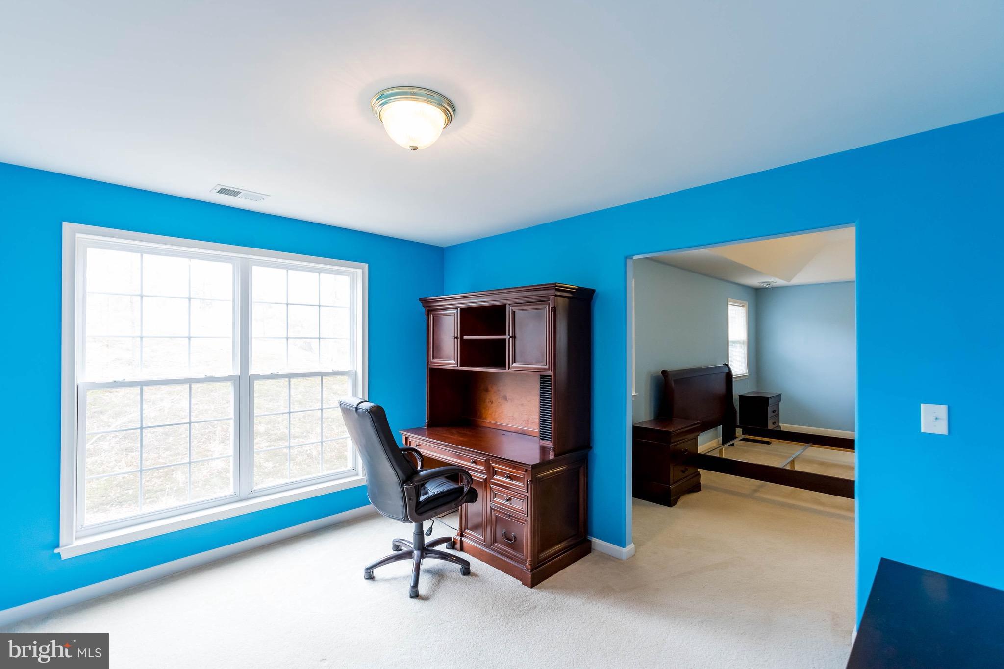 6732 North Stuart Road King George, VA 22485 - Photo 17 of 30 a workspace with furniture and a window