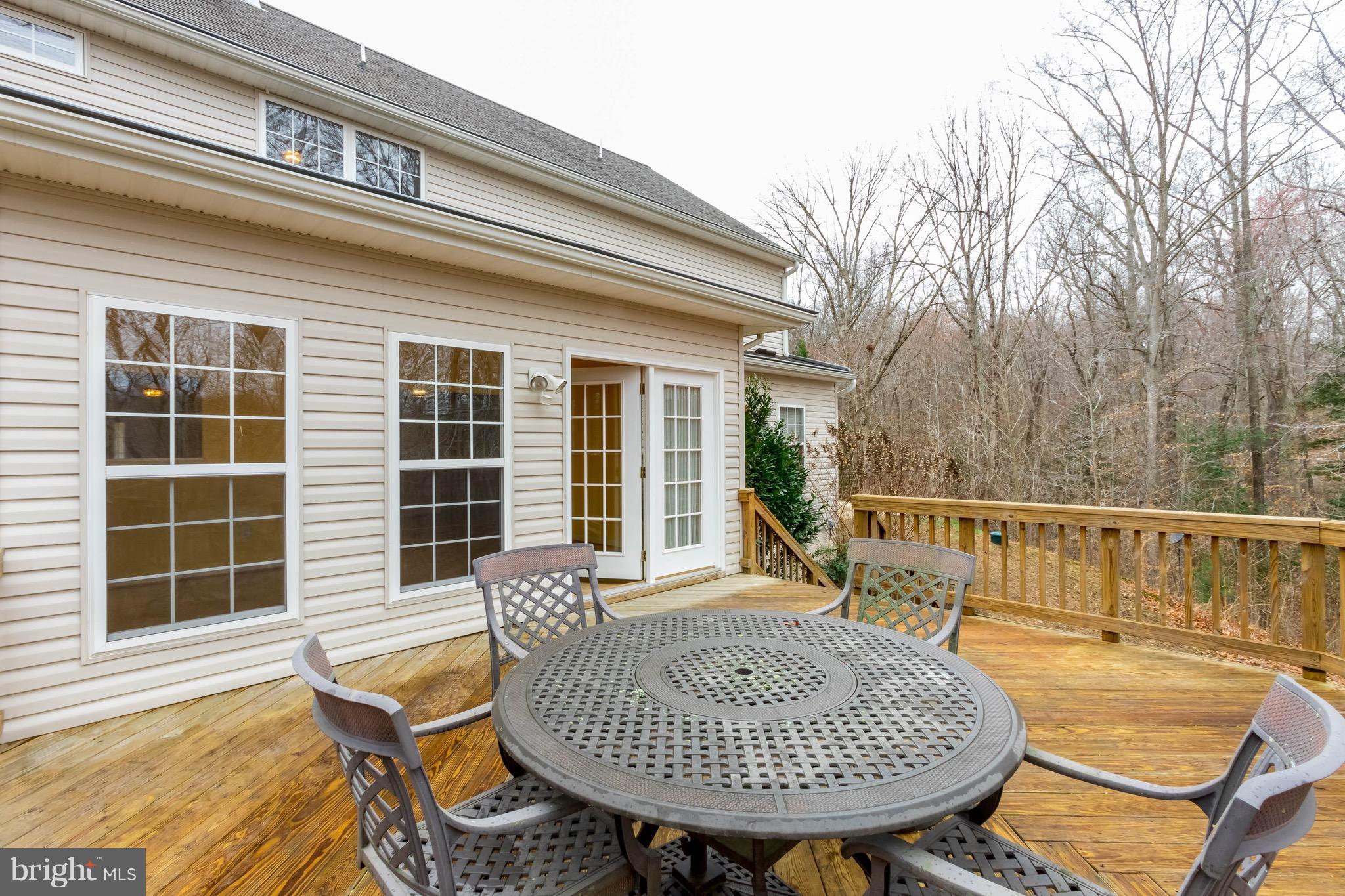 6732 North Stuart Road King George, VA 22485 - Photo 28 of 30 a view of balcony with a table and chairs