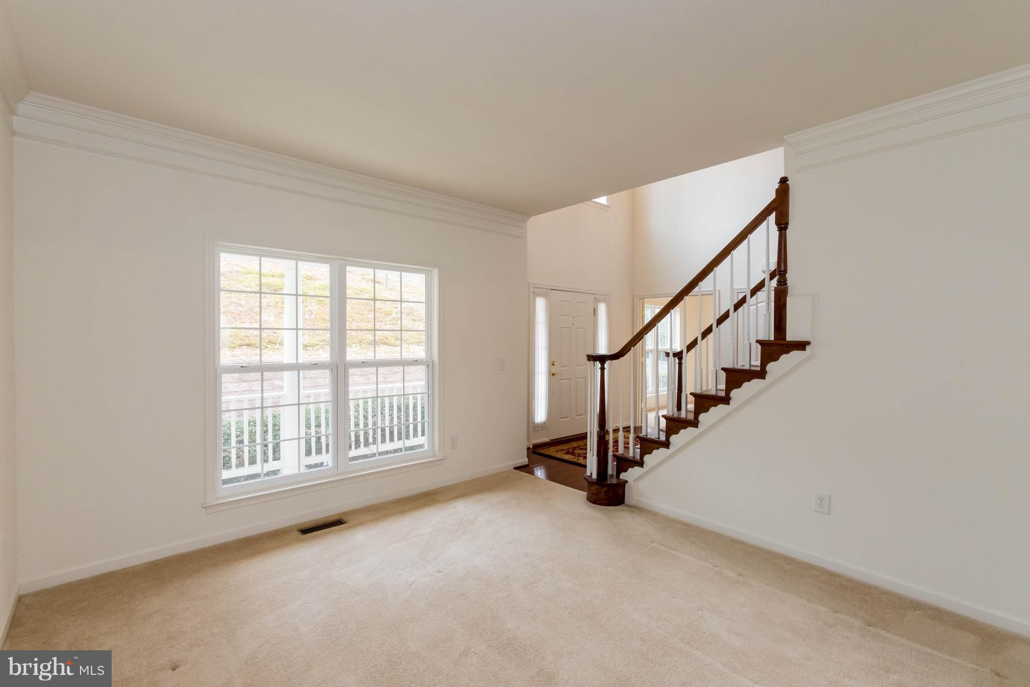 6732 North Stuart Road King George, VA 22485 - Photo 5 of 30 a view of an empty room with stairs