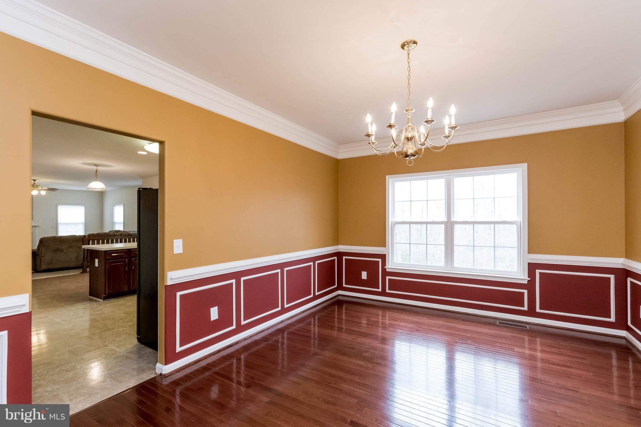 6732 North Stuart Road King George, VA 22485 - Photo 7 of 30 a view of livingroom with hardwood floor and window