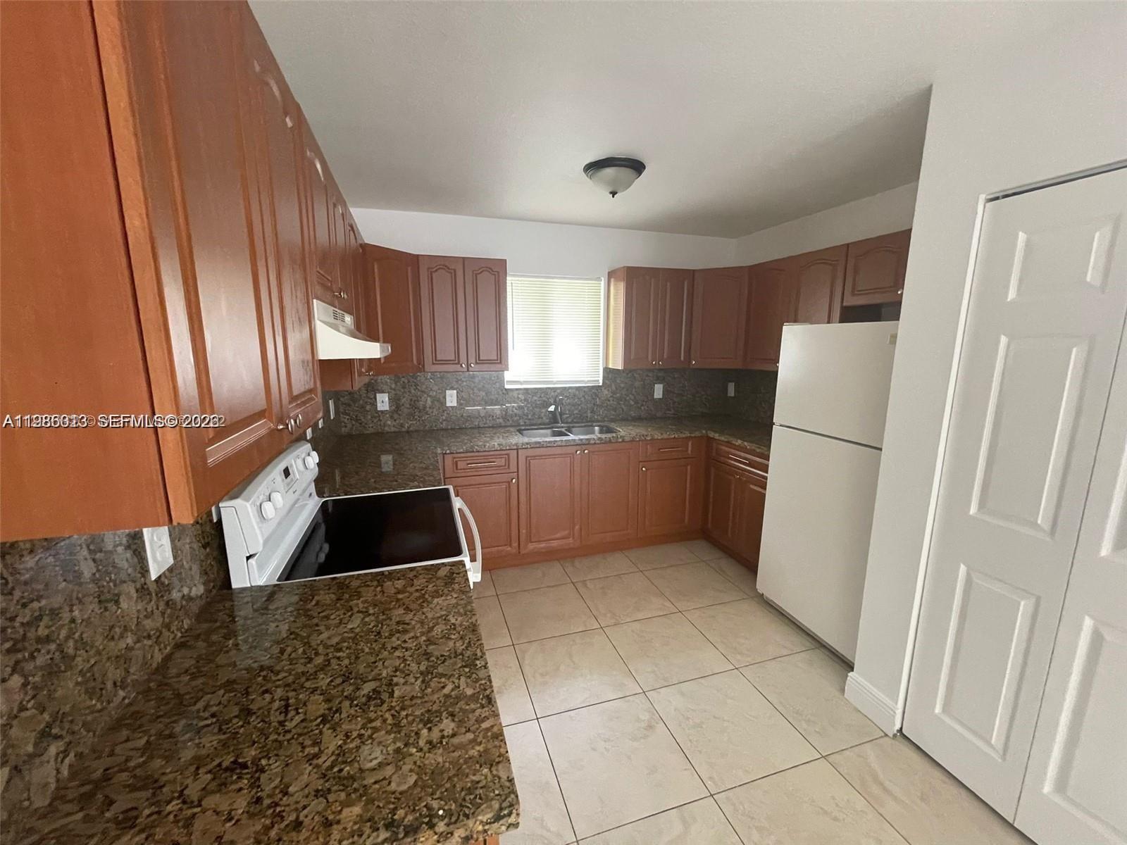 1285 Northwest 59th Street, Unit 2 Miami, FL 33142 - Photo 2 of 7