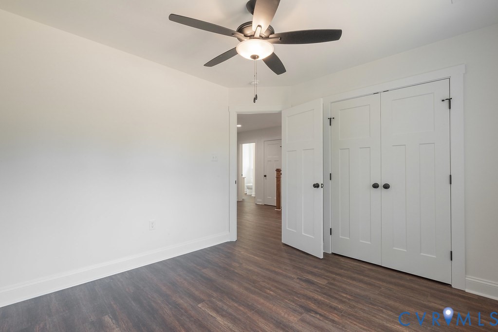 Lot 6 Tabscott Road Columbia, VA 23038 - Photo 41 of 42 Unfurnished bedroom featuring dark wood-type floor