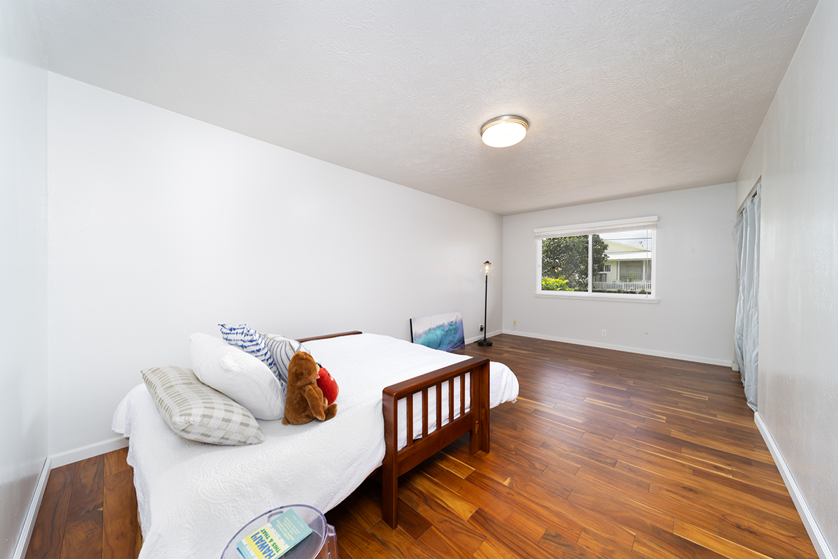 420 Huali Place Hilo, HI 96720 - Photo 14 of 30 a bedroom with bed and a window
