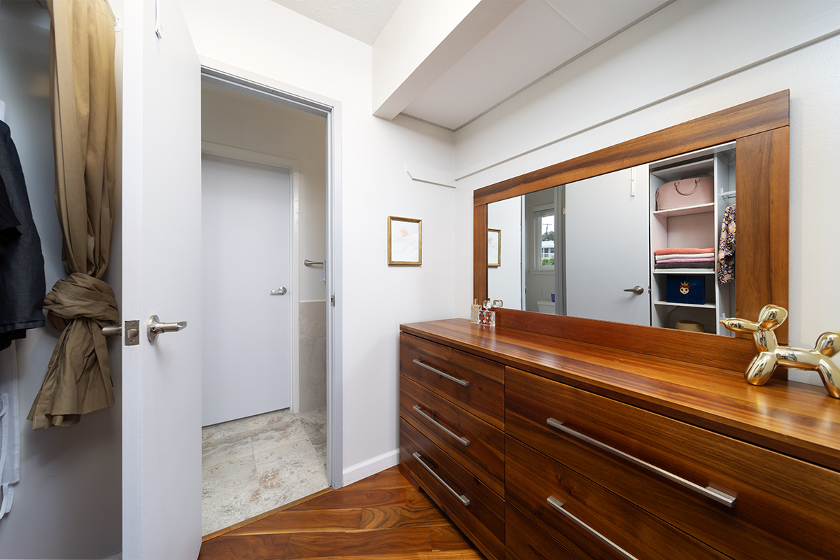 420 Huali Place Hilo, HI 96720 - Photo 16 of 30 a room with a bed and a dresser