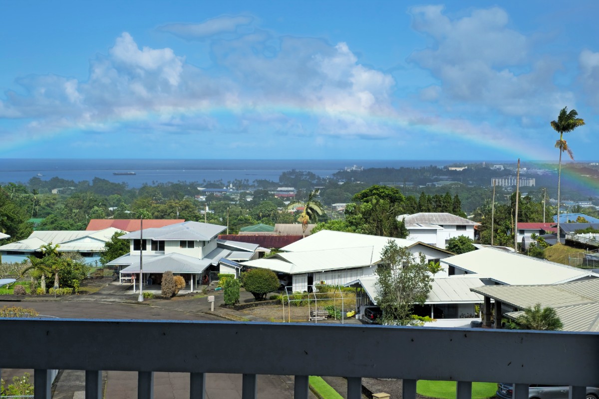 420 Huali Place Hilo, HI 96720 - Photo 30 of 30 a view of a city with lots of residential buildings ocean and mountain view in back