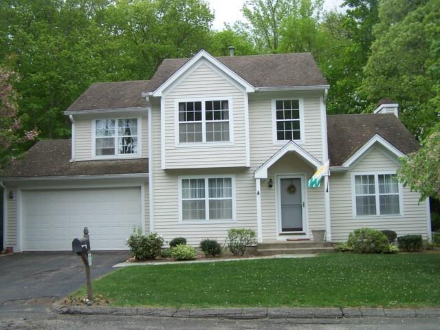 3 Indian Hill Road, Unit 3 Monroe, CT 06468 - Photo 1 of 1 a front view of a house with a yard and garage