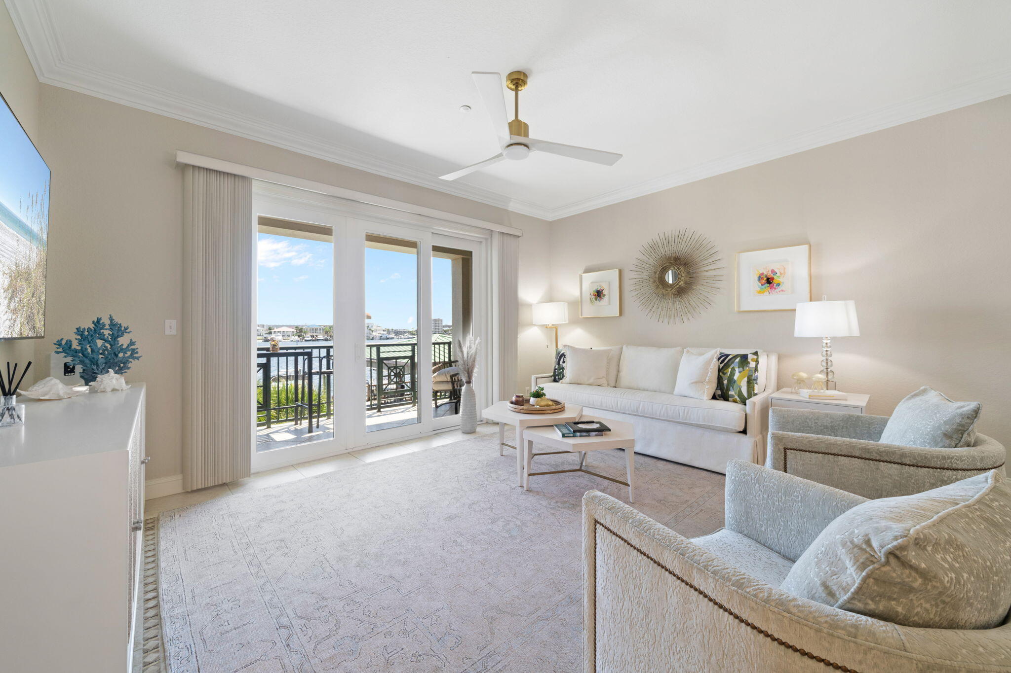 602 Harbor Boulevard, Unit 103 Destin, FL 32541 - Photo 23 of 47 a living room with furniture and large windows