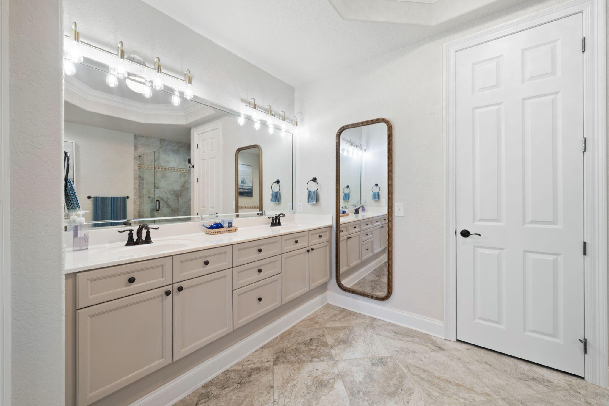 602 Harbor Boulevard, Unit 103 Destin, FL 32541 - Photo 28 of 47 a spacious bathroom with a double vanity sink mirror and