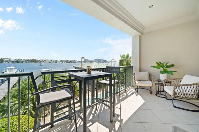 a view of a chairs and table in patio