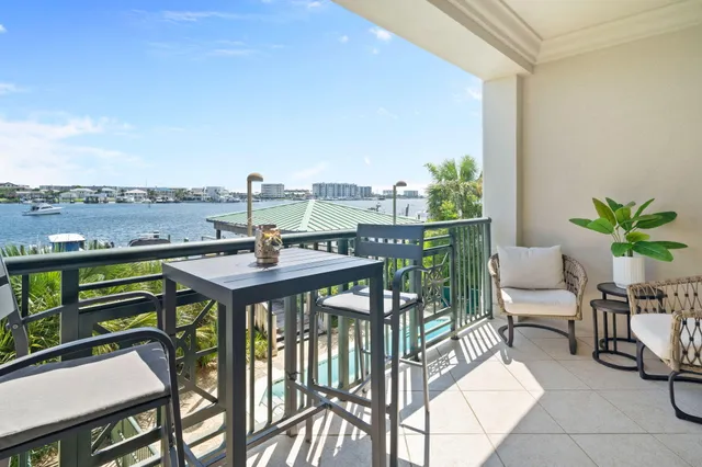 a terrace with outdoor seating and city view
