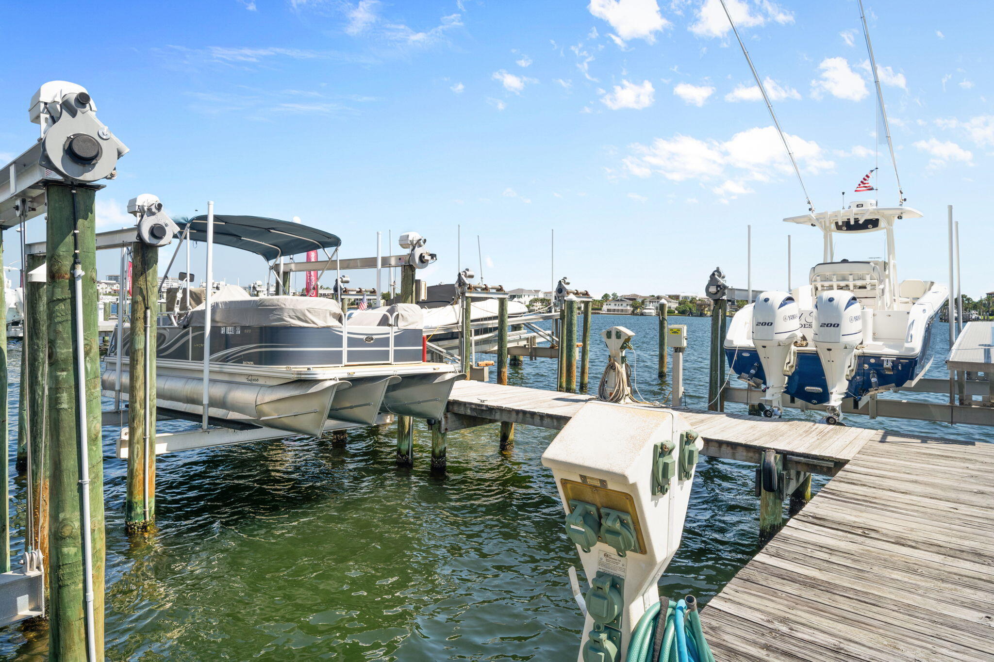 602 Harbor Boulevard, Unit 103 Destin, FL 32541 - Photo 37 of 47 a view of a terrace with seating area