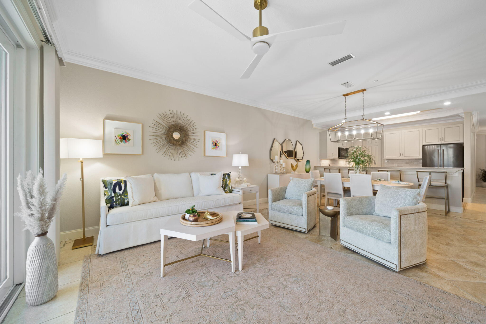 602 Harbor Boulevard, Unit 103 Destin, FL 32541 - Photo 4 of 47 a living room with furniture and kitchen view