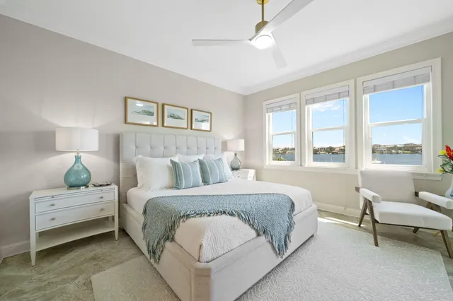 a bedroom with a bed and a couch