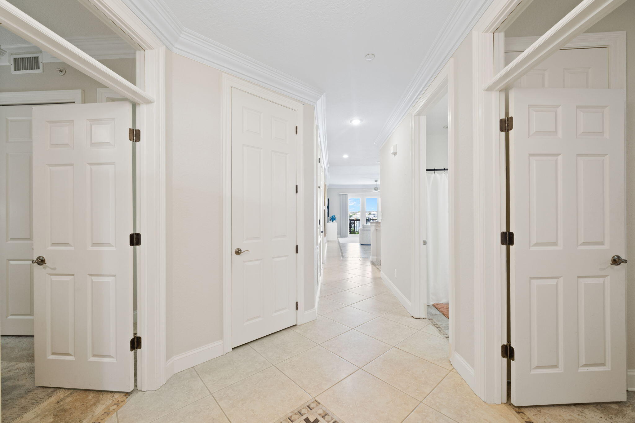 602 Harbor Boulevard, Unit 103 Destin, FL 32541 - Photo 8 of 47 a view of a hallway with wooden floor