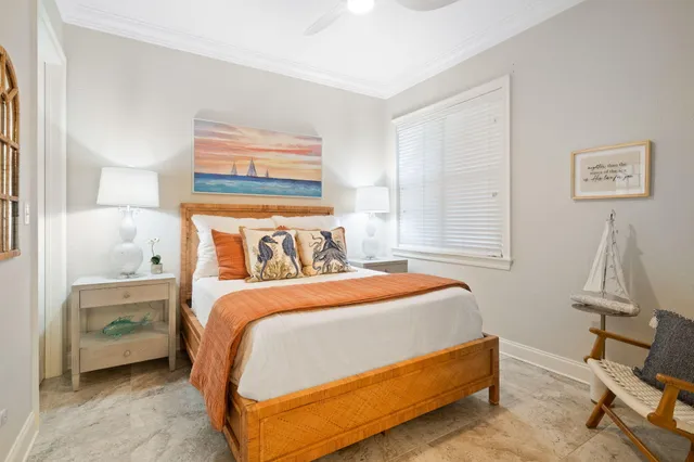 a bed room with a bed and a window