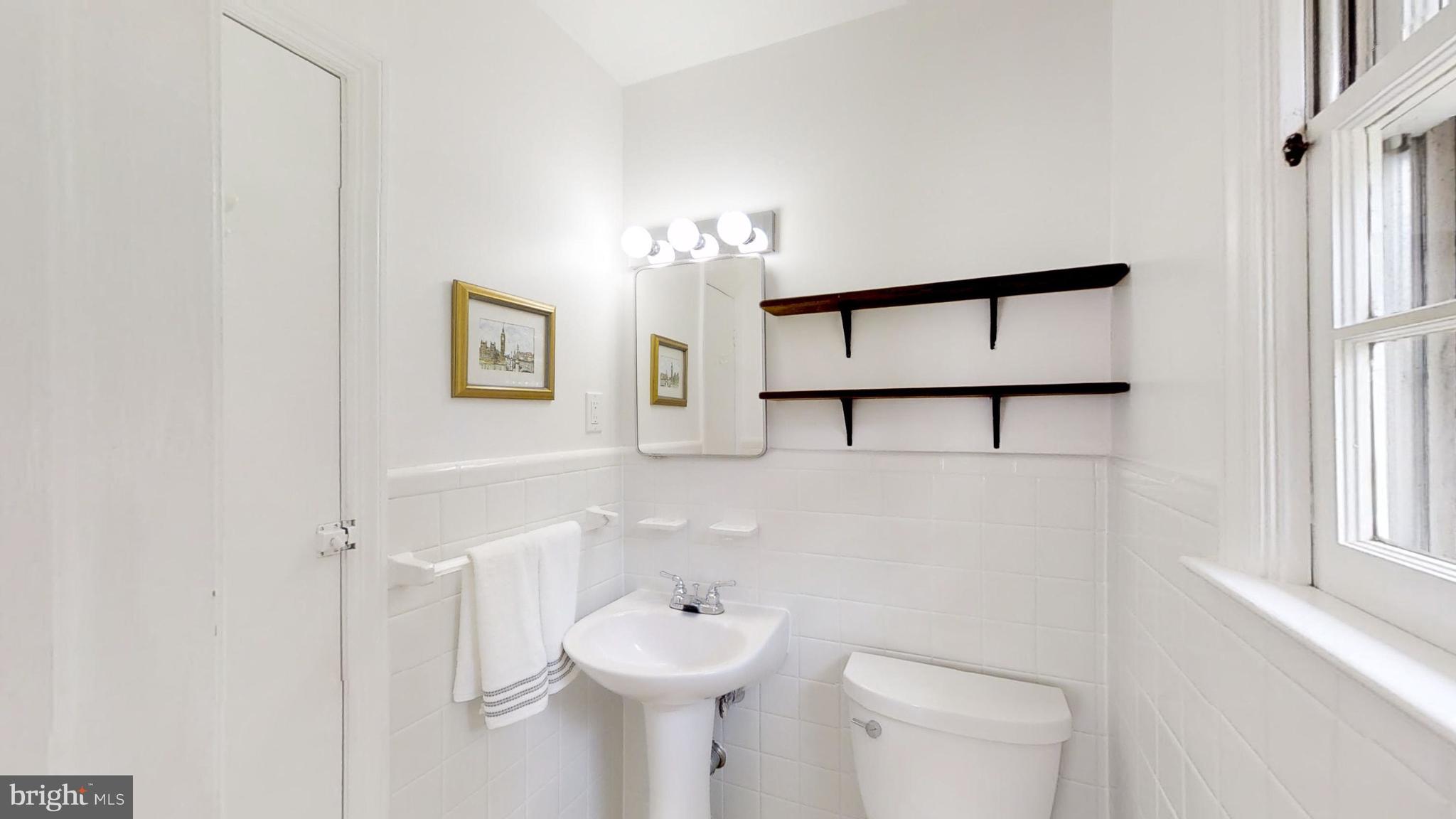 1214 Winstead Road Wilmington, DE 19803 - Photo 15 of 21 Bright and white master 1/2 bath