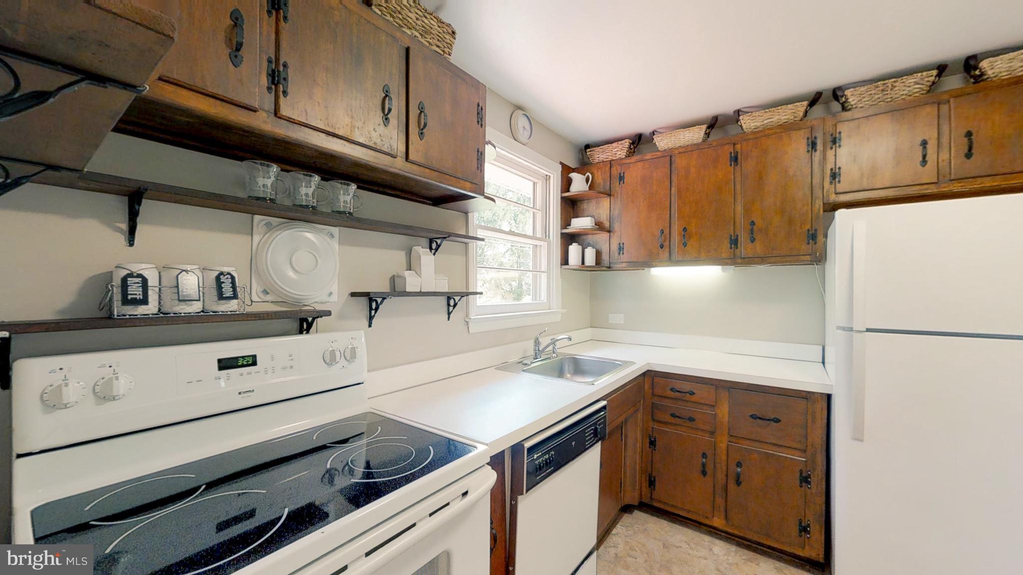 1214 Winstead Road Wilmington, DE 19803 - Photo 9 of 21 Ample wood cabinetry