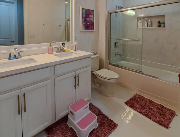 a large white bed in a white room