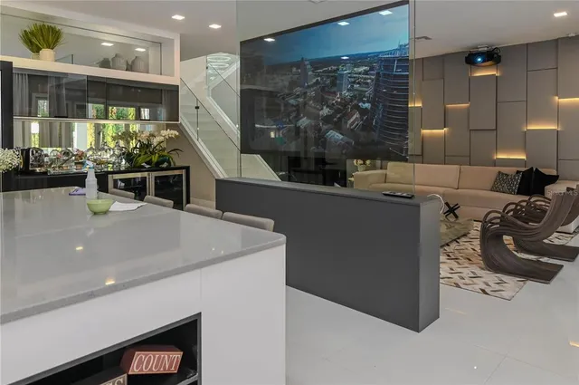 a kitchen with a sink and a stove top oven
