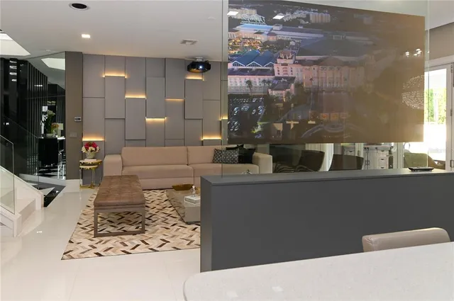 a living room with a couch and a fireplace