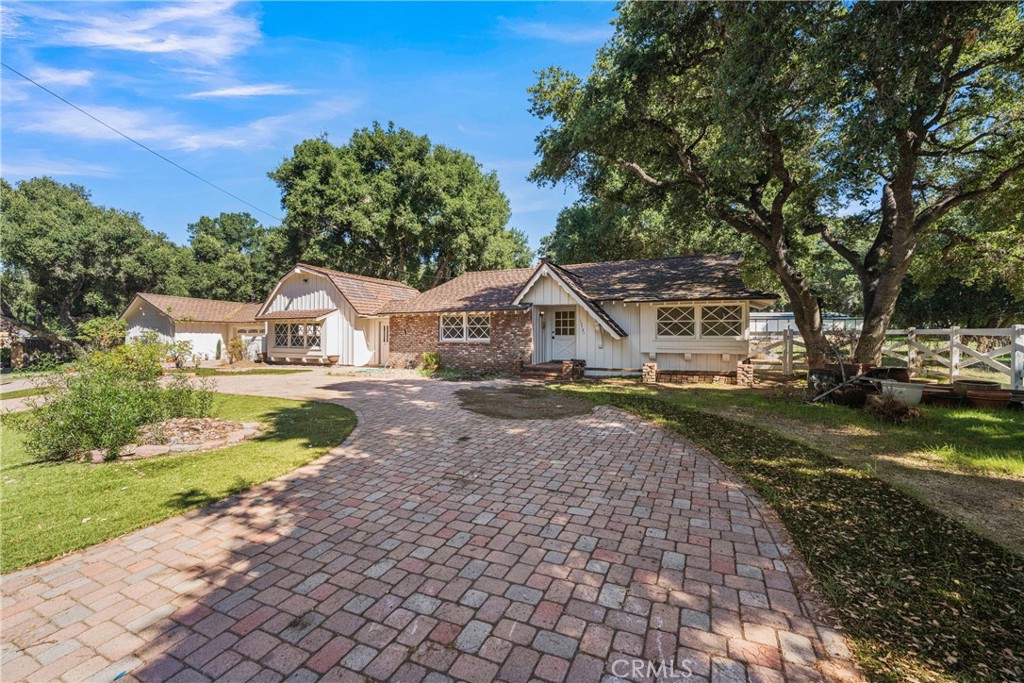 15721 Iron Canyon Road Canyon Country, CA 91387 - Photo 1 of 1 a view of house with garden space and sitting area