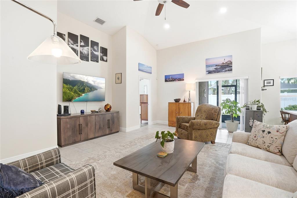 2906 West Douglas Street Tampa, FL 33607 - Photo 8 of 36 a living room with furniture and wooden floor