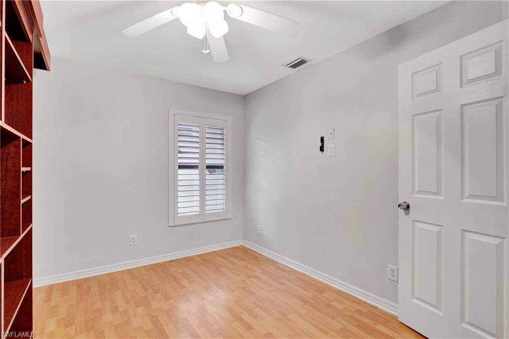 3035 42nd Terrace Southwest Naples, FL 34116 - Photo 28 of 48 2nd guest room featuring ceiling fan and light wood-type flooring.