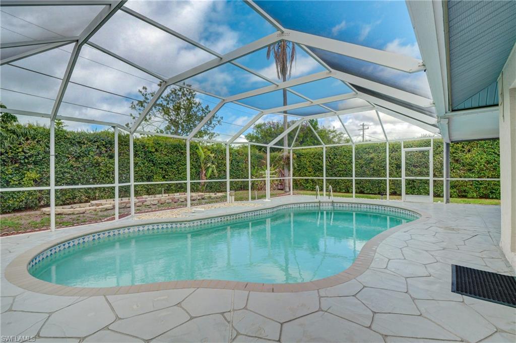 3035 42nd Terrace Southwest Naples, FL 34116 - Photo 42 of 48 View of swimming pool and lanai.