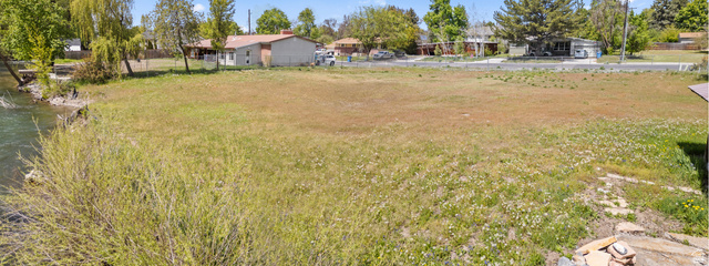472 East 300 South Logan, UT 84321 - Photo 7 of 9 Expansive grassy lot bordering a tranquil waterway