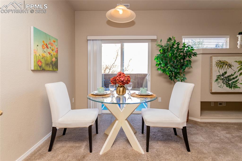 1534 York Road Colorado Springs, CO 80920 - Photo 16 of 38 a dining room with furniture and window