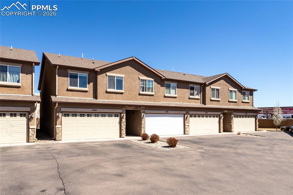 1534 York Road Colorado Springs, CO 80920 - Photo 2 of 38 a view of a house with a garage and a garage