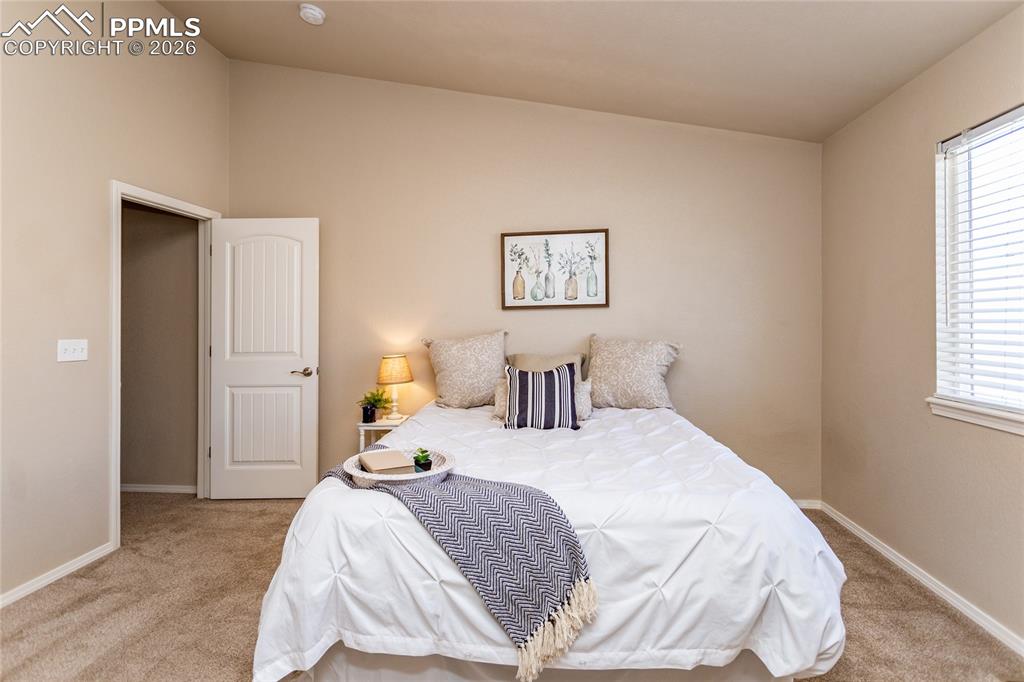 1534 York Road Colorado Springs, CO 80920 - Photo 26 of 38 a bedroom with a bed and a window