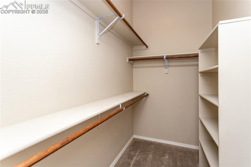 1534 York Road Colorado Springs, CO 80920 - Photo 31 of 38 a view of storage and utility room with racks on the wall