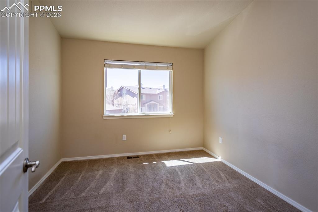 1534 York Road Colorado Springs, CO 80920 - Photo 34 of 38 an empty room with a window