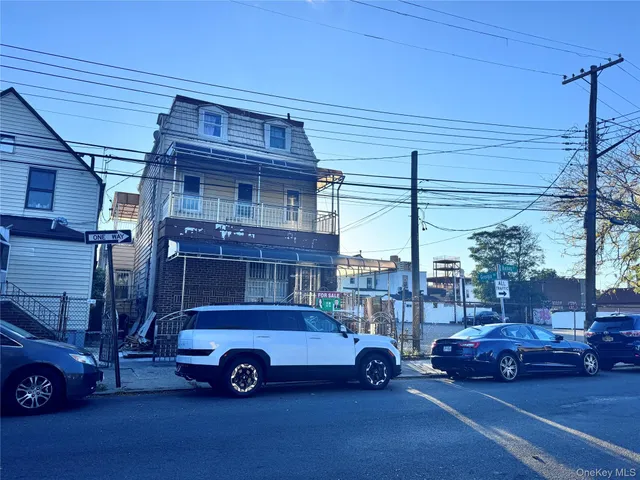 a car parked in front of a house