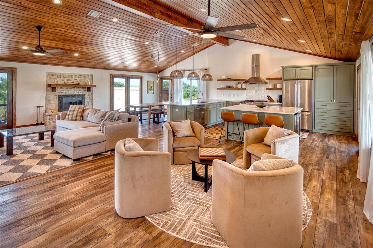 19811 West Ranch Road 152 Llano, TX 78643 - Photo 21 of 38 a living room with furniture and a fireplace