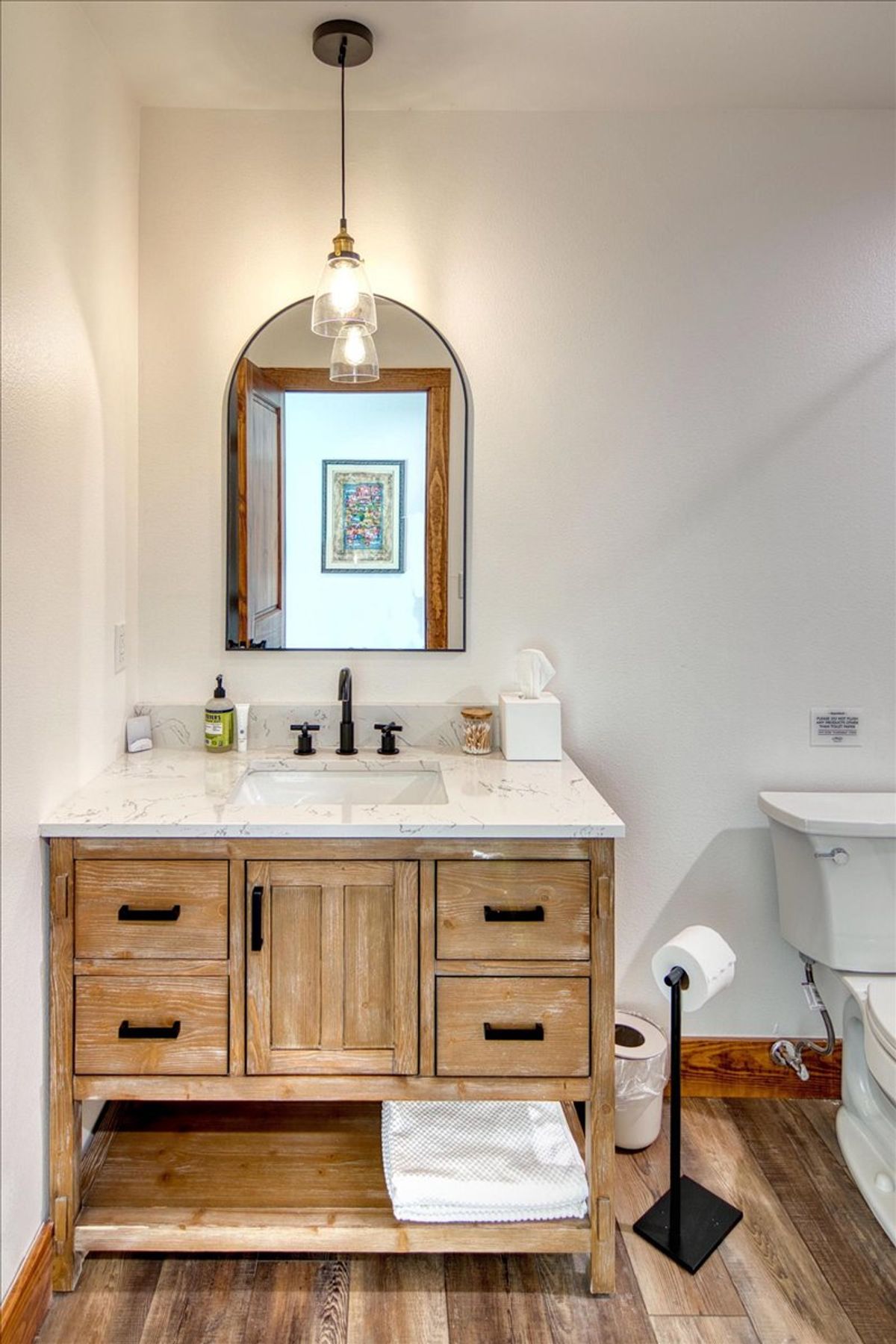 19811 West Ranch Road 152 Llano, TX 78643 - Photo 33 of 38 a spacious bathroom with a sink and a mirror