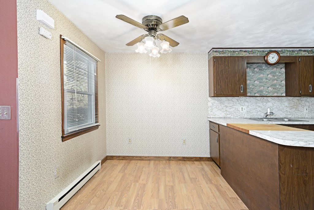 2240-2242 Barre Road Hardwick, MA 01031 - Photo 14 of 31 a view of an empty room with window and wooden floor