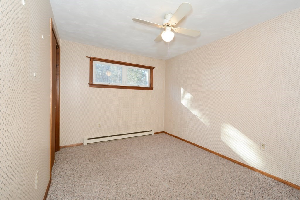 2240-2242 Barre Road Hardwick, MA 01031 - Photo 19 of 31 an empty room with a fan & a window