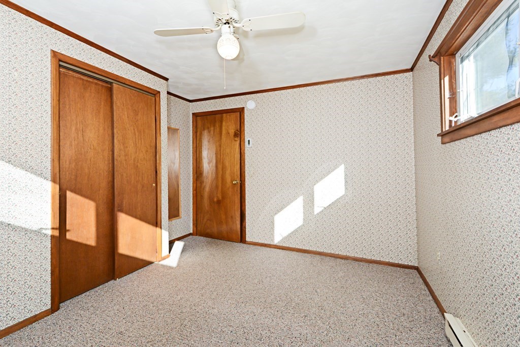 2240-2242 Barre Road Hardwick, MA 01031 - Photo 23 of 31 a view of a big room with wooden floor and windows