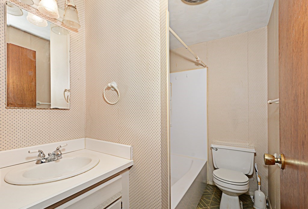 2240-2242 Barre Road Hardwick, MA 01031 - Photo 24 of 31 a bathroom with a sink a toilet and a mirror