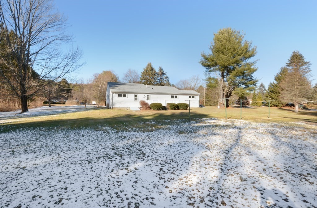 2240-2242 Barre Road Hardwick, MA 01031 - Photo 10 of 31 a view of a yard with a house in the background