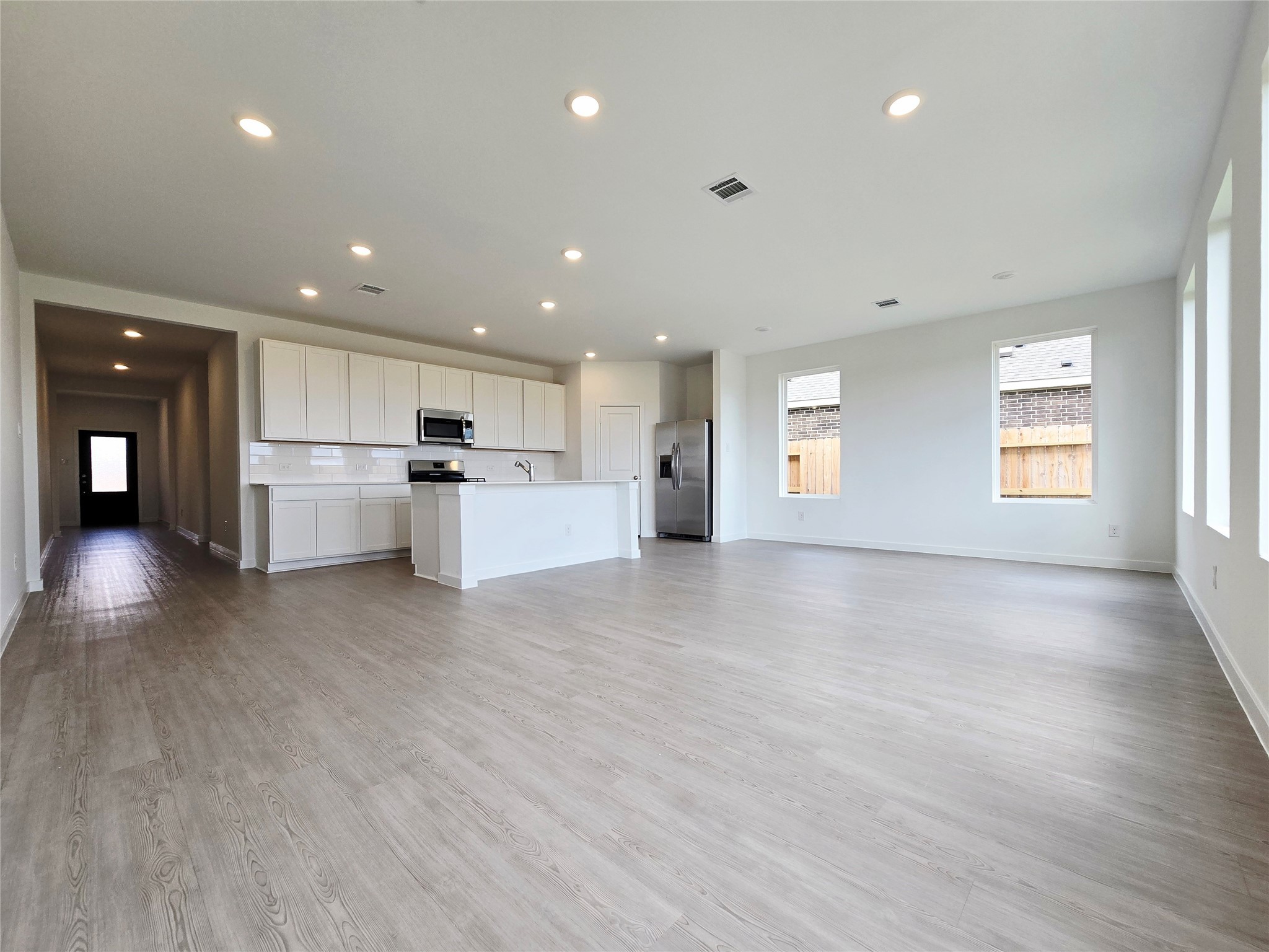 3112 Ruby Ridge Drive Katy, TX 77493 - Photo 20 of 24 a view of a kitchen with a sink and a stove top oven
