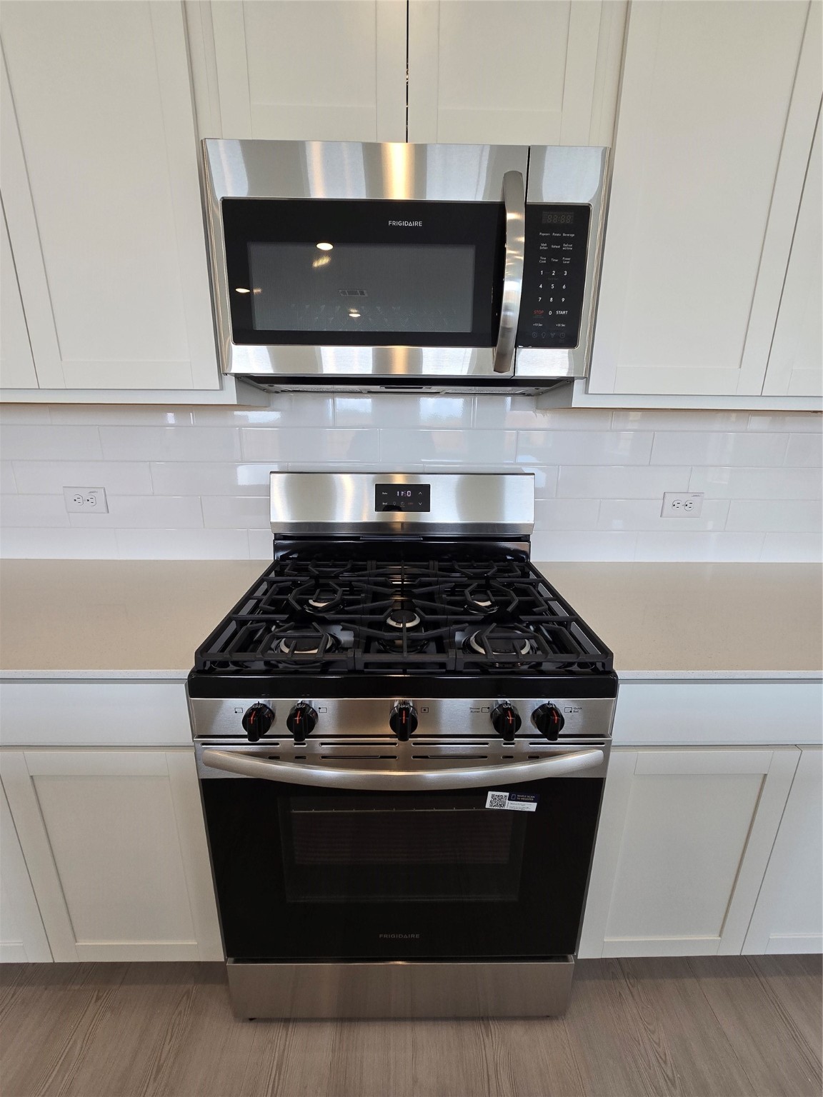 3112 Ruby Ridge Drive Katy, TX 77493 - Photo 23 of 24 a stove top oven sitting inside of a kitchen