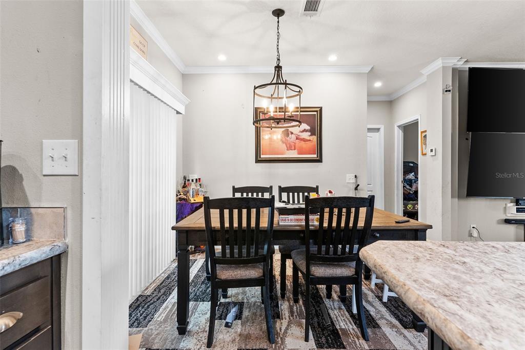 8010 Palmer Road Bartow, FL 33830 - Photo 12 of 22 a view of a dining room with furniture